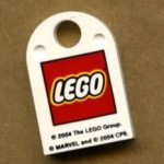 Putting a piece of cardboard behind a white or clear LEGO piece creates a contrasting background.